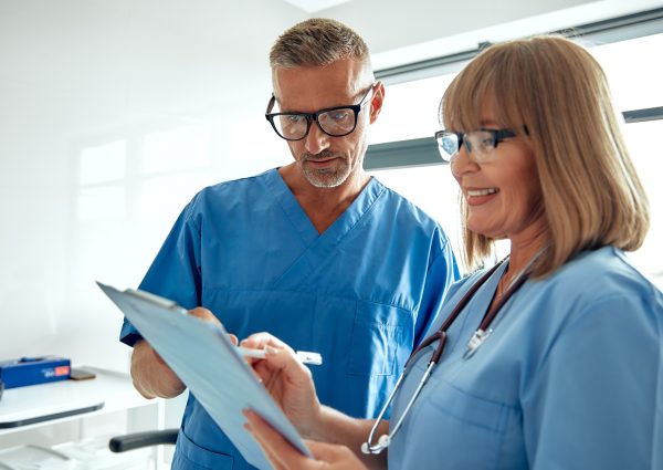 Medical Professionals Working Together to Improve Patient Care and Outcomes Effectively